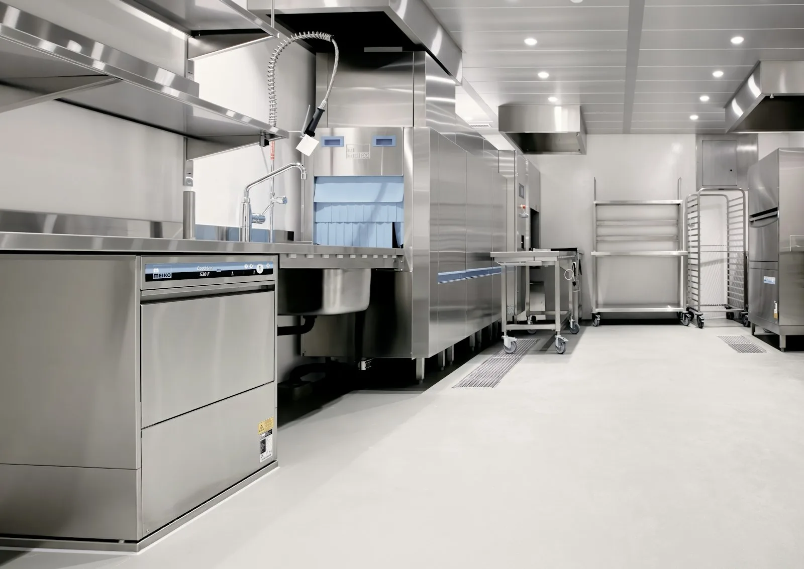 Stainless steel commercial kitchen fitted with dishwashing and warewashing equipment